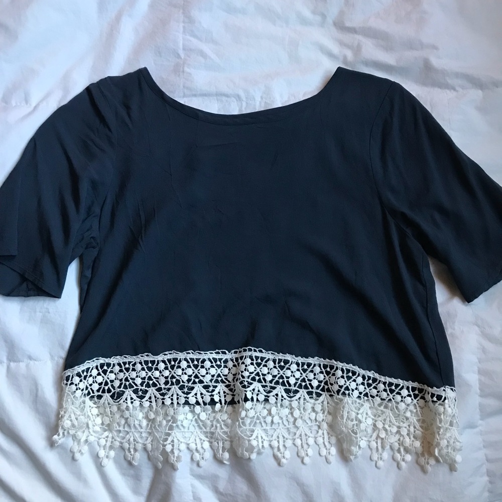 Navy blue top with crocheted trim